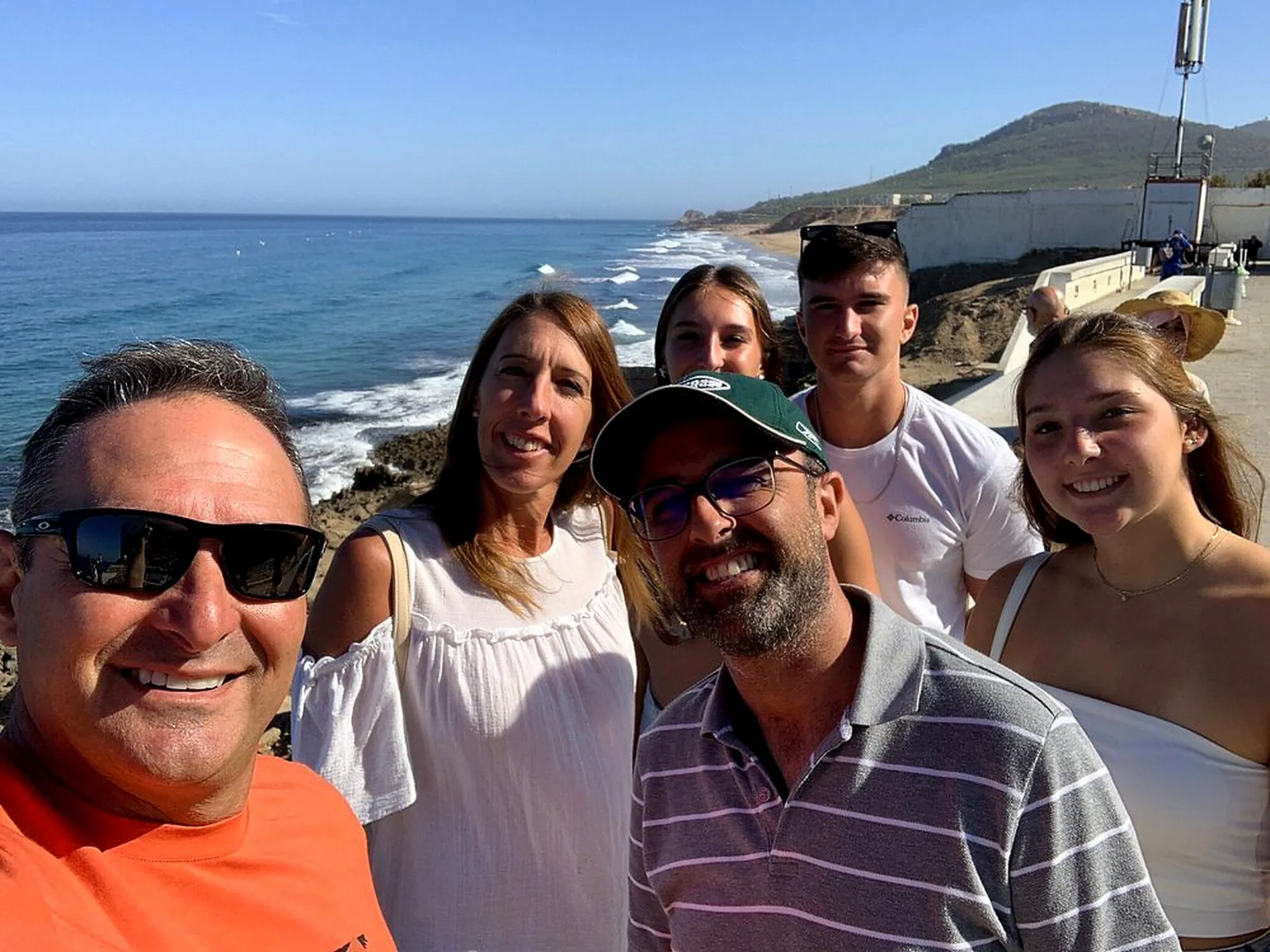A family selfie with the Atlantic coast behind