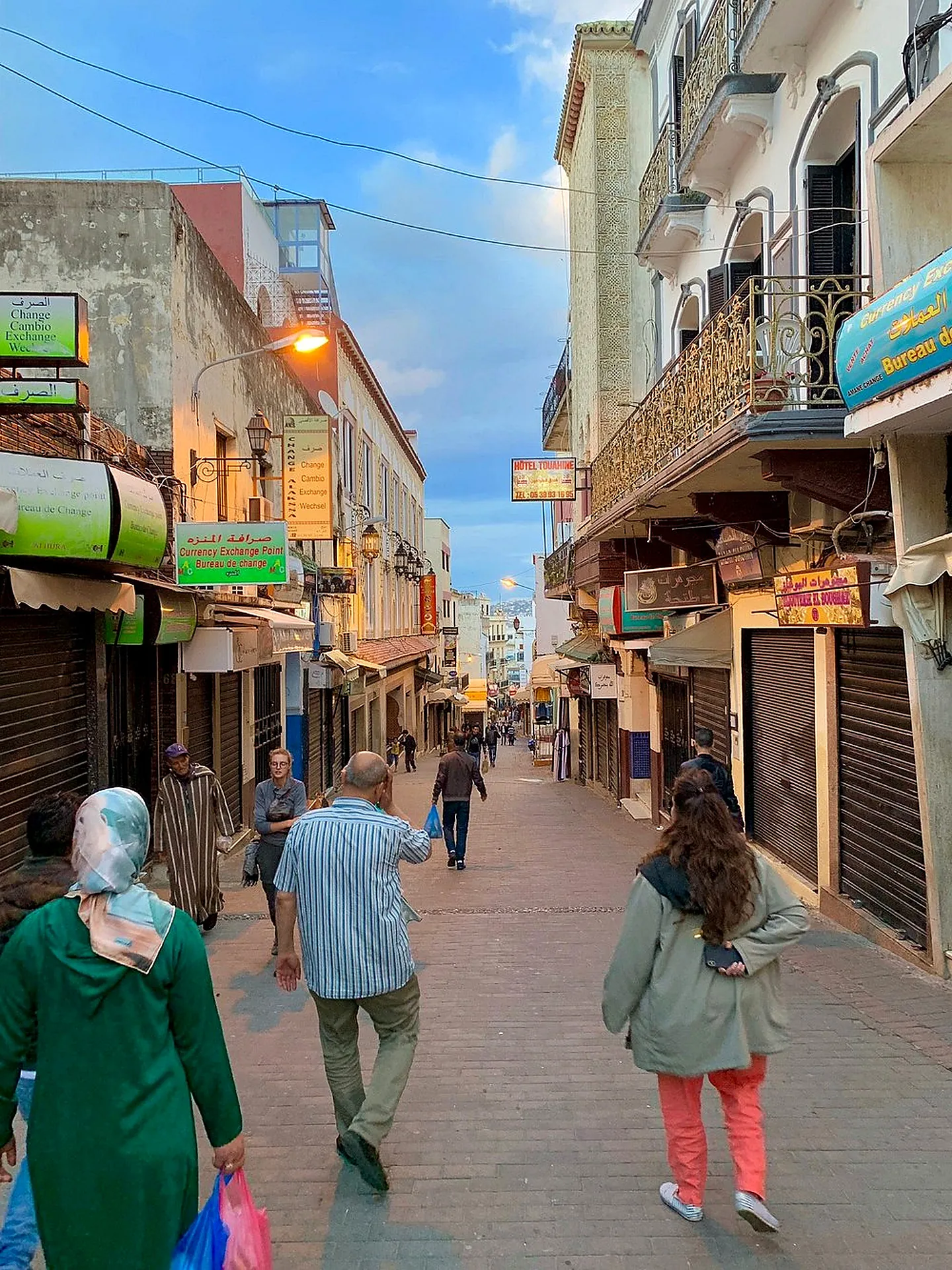 Guests walking through a Medina street