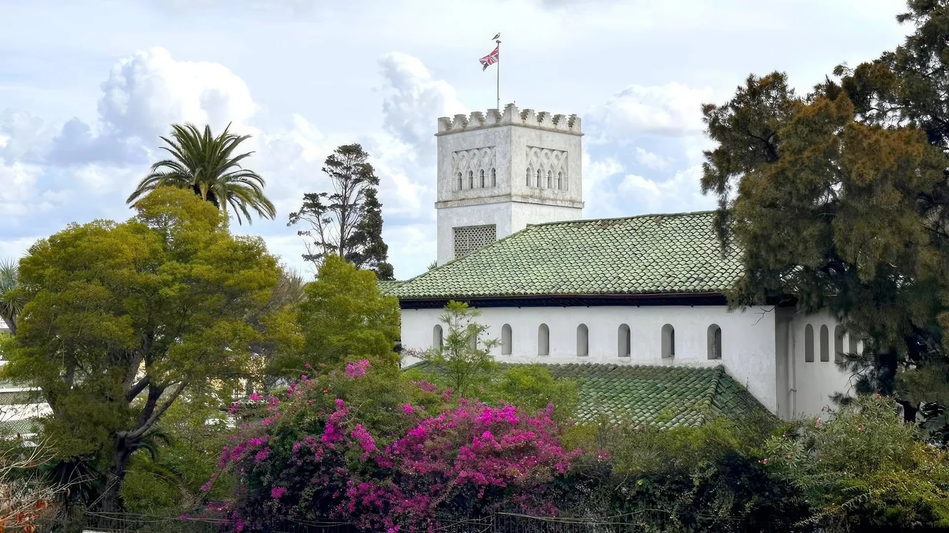 The tower of St Andrew’s Church above the gardens