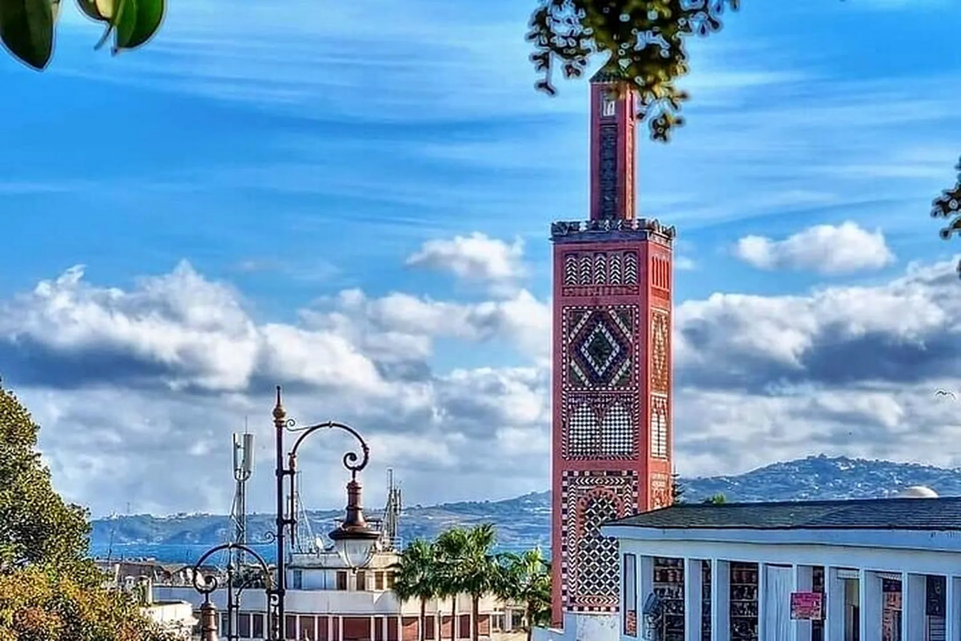 A tiled minaret above Tangier port
